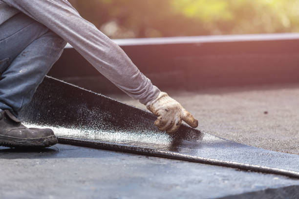 Professional Emergency Waterproofing technician working in Falls Church, VA